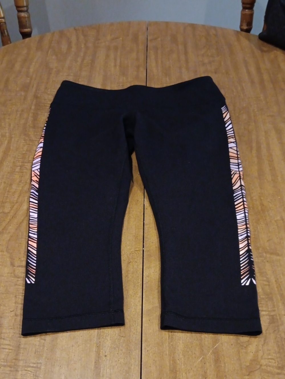 lululemon athletica Black Capri Leggings with Pink and White Side Stripe